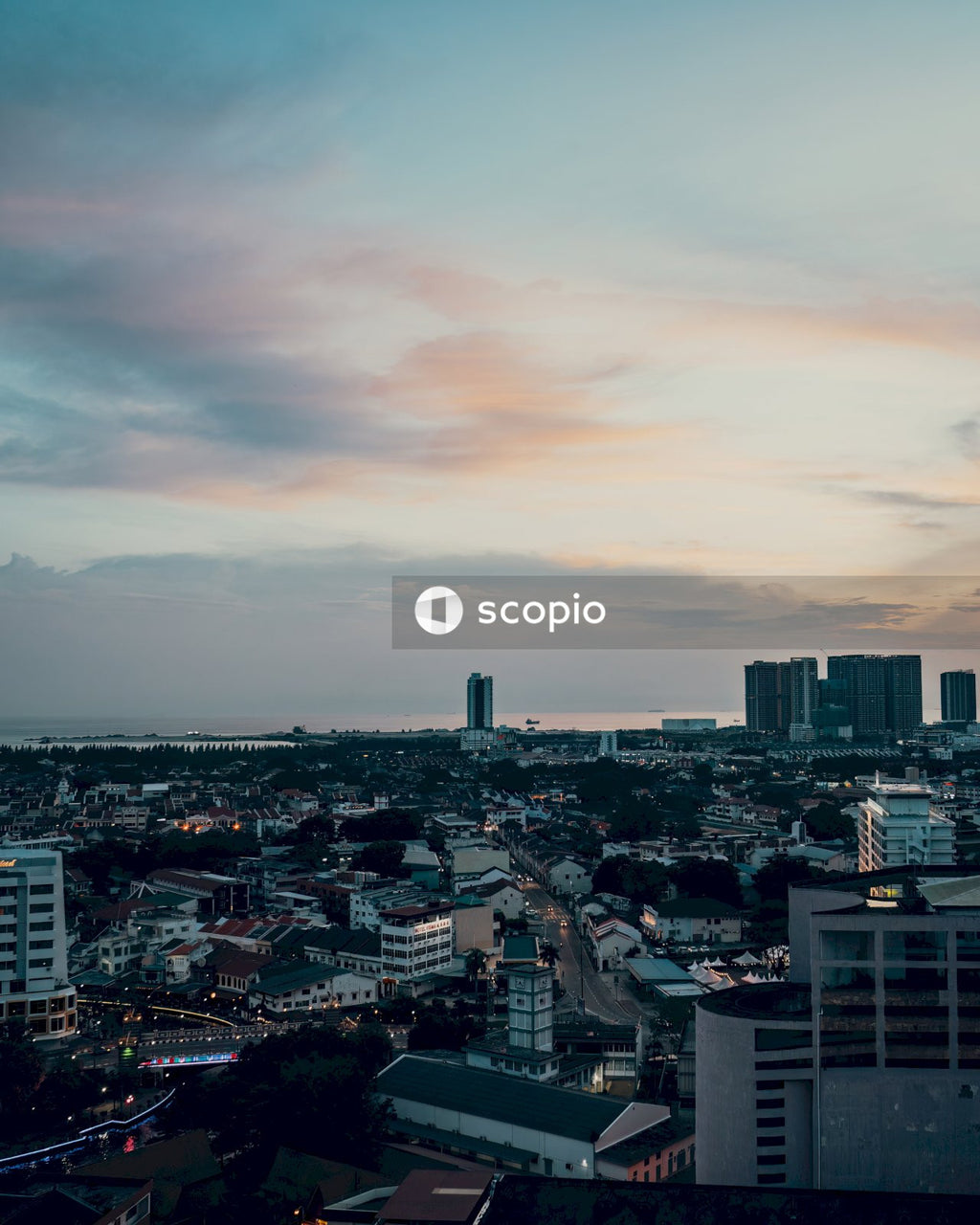 City skyline under cloudy sky