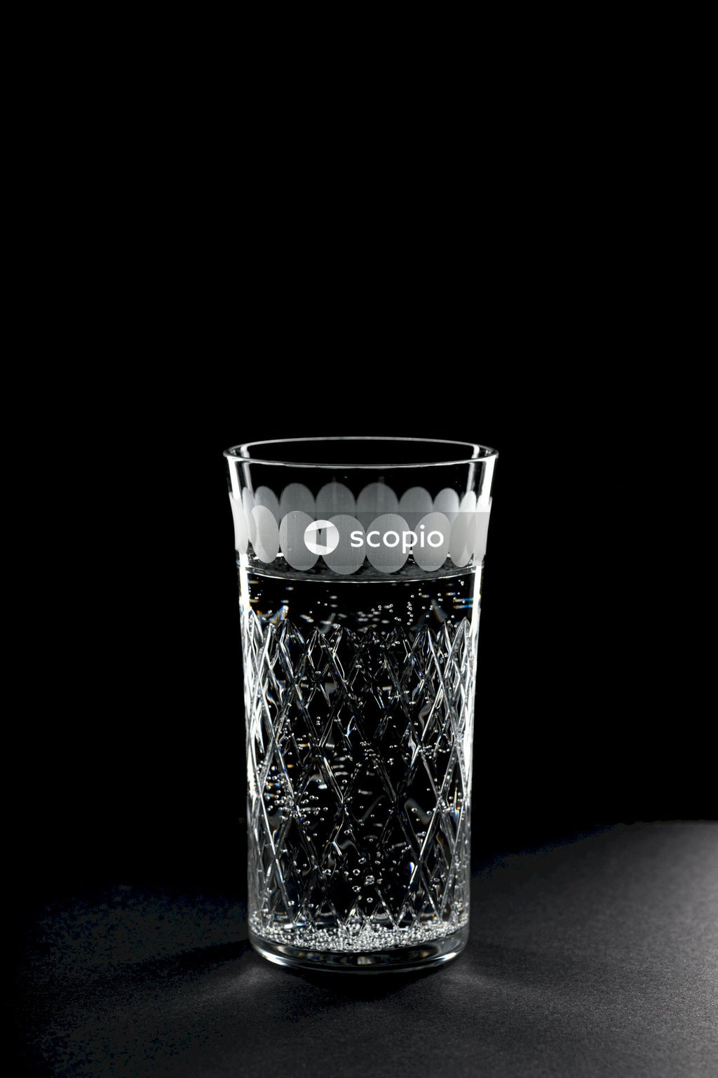 Clear drinking glass with ice cubes