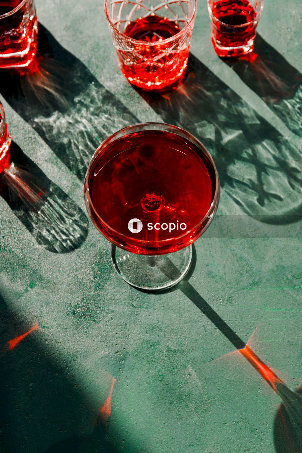 Clear drinking glass with red liquid