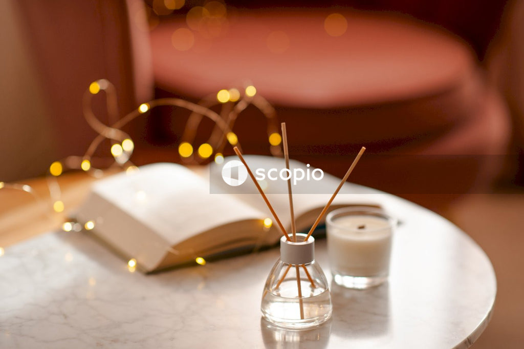 Clear glass bottle on white paper