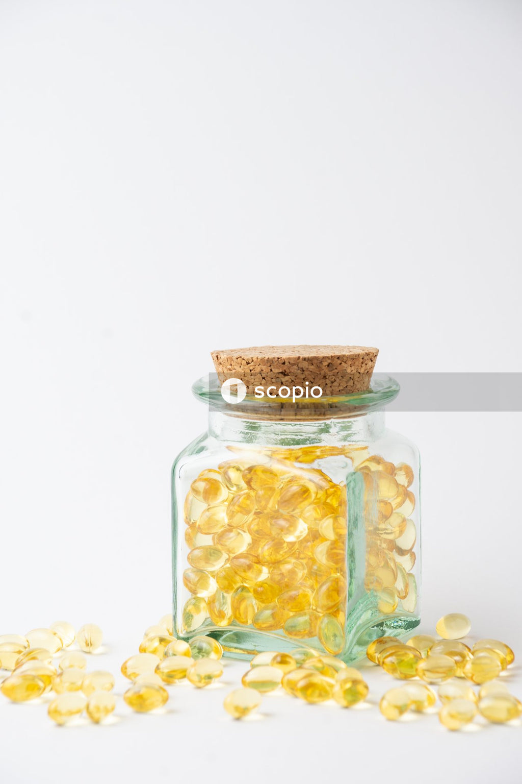 Clear glass jar with white and yellow beans