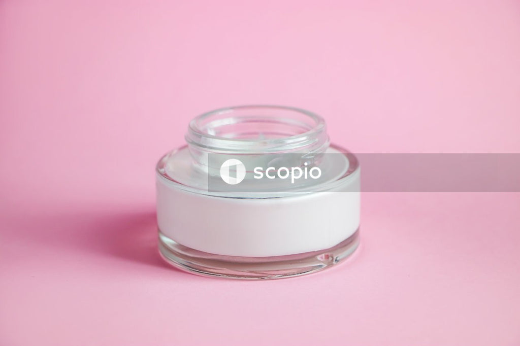 Clear glass jar with white lid