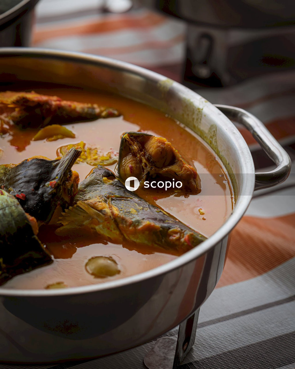 Cooked food in stainless steel cooking pot
