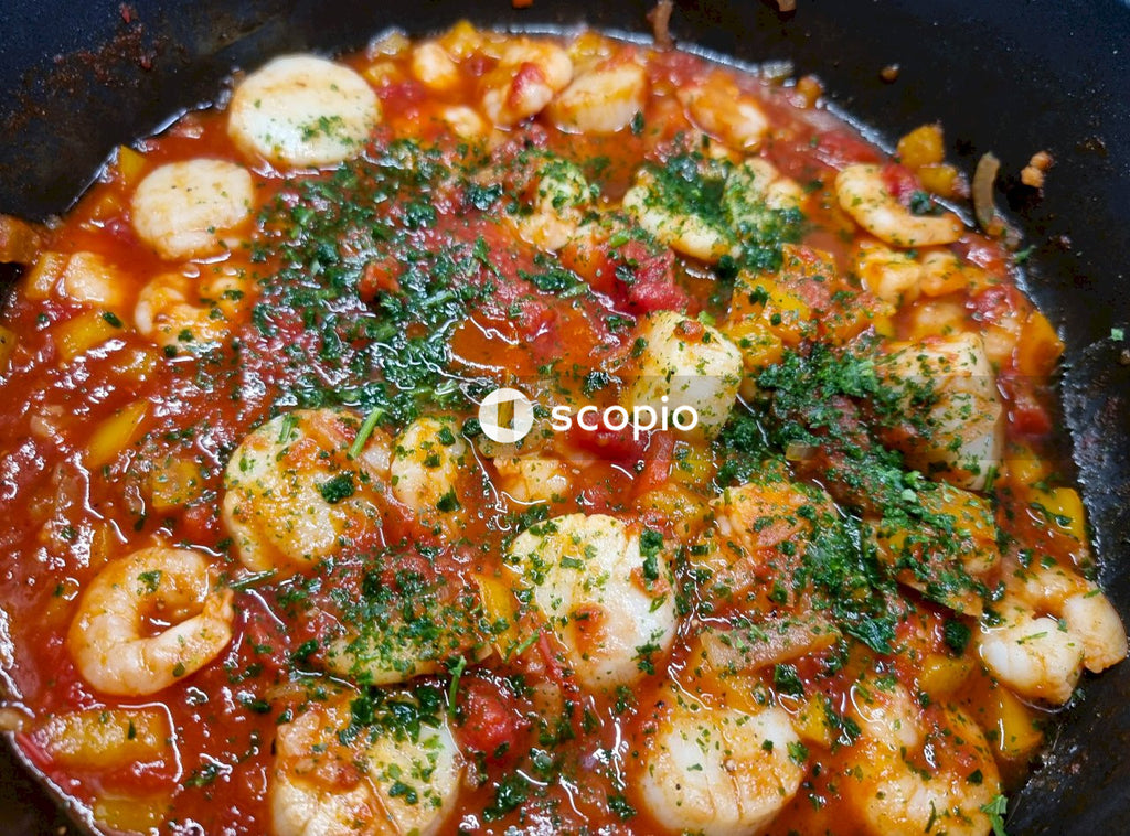Cooked food on black cooking pan