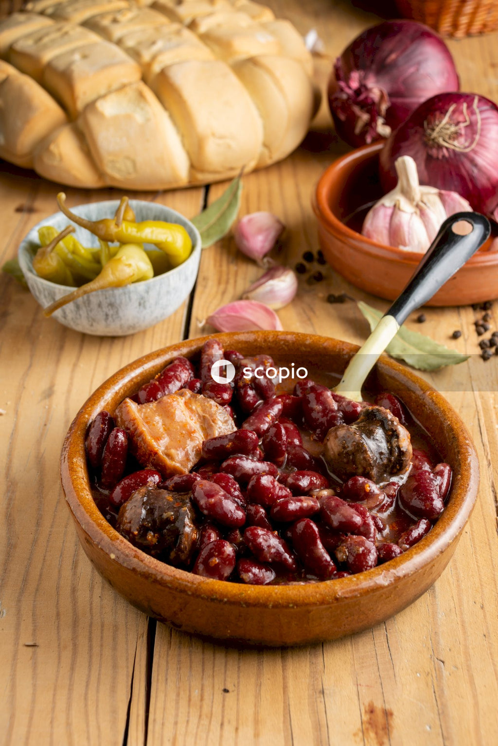 Cooked food on brown wooden bowl