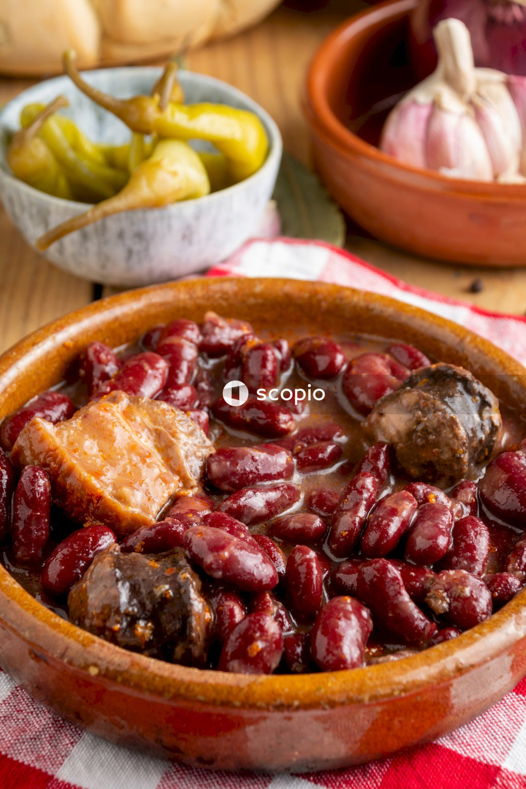 Cooked food on brown wooden bowl