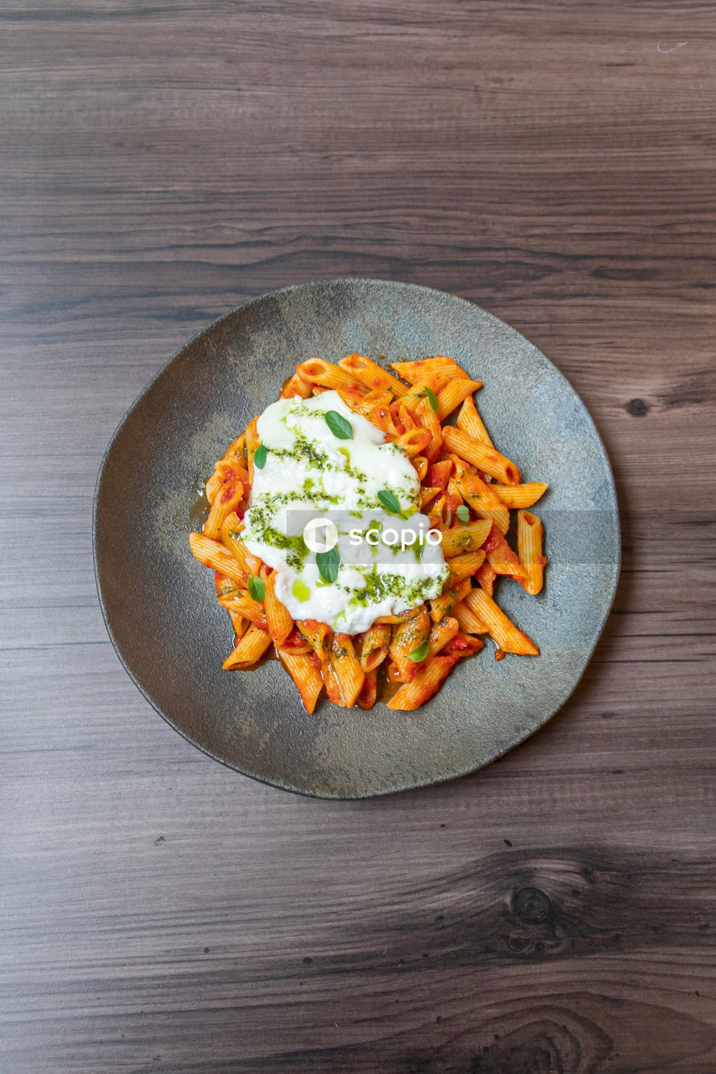 Cooked food on round brown ceramic plate