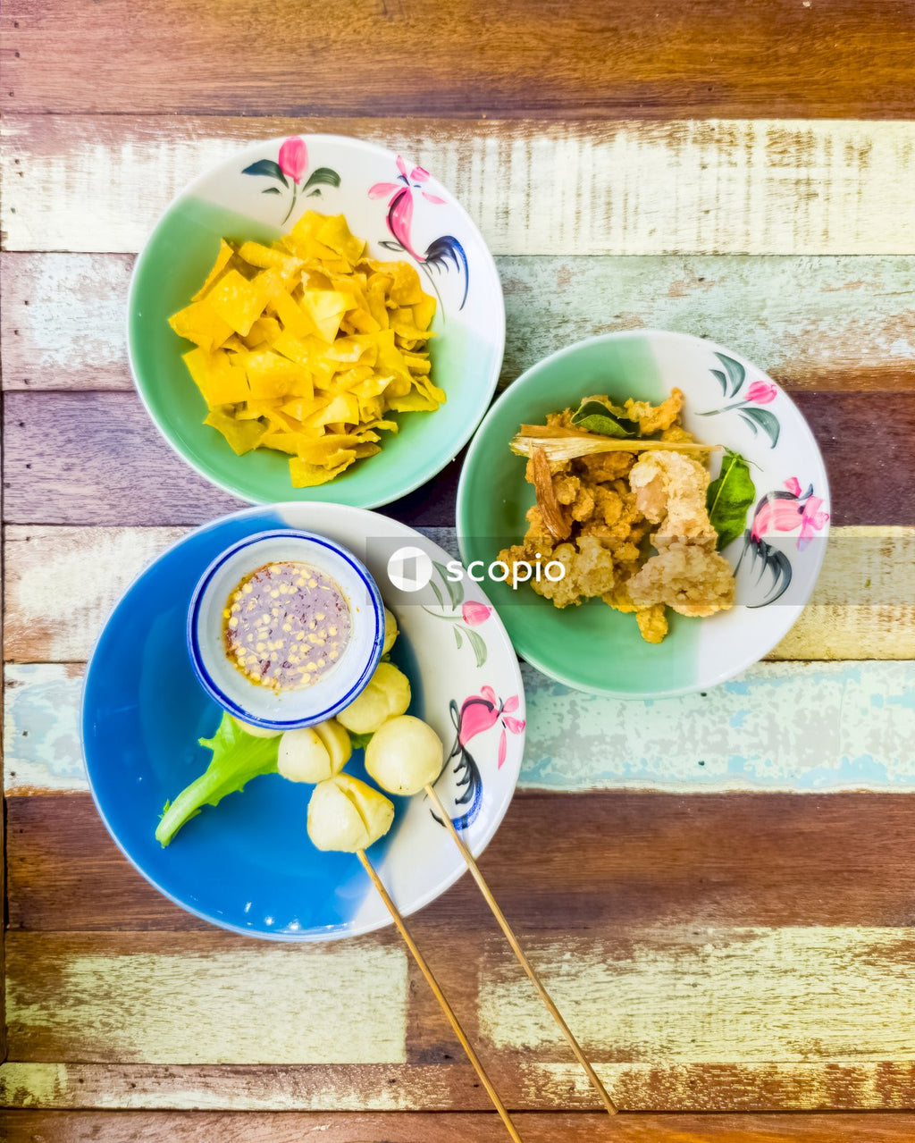 Cooked food on white and green ceramic plate
