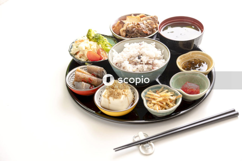 Cooked food on white ceramic bowls