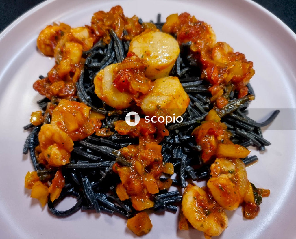 Cooked food on white ceramic plate
