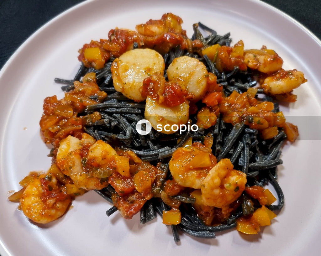 Cooked food on white ceramic plate
