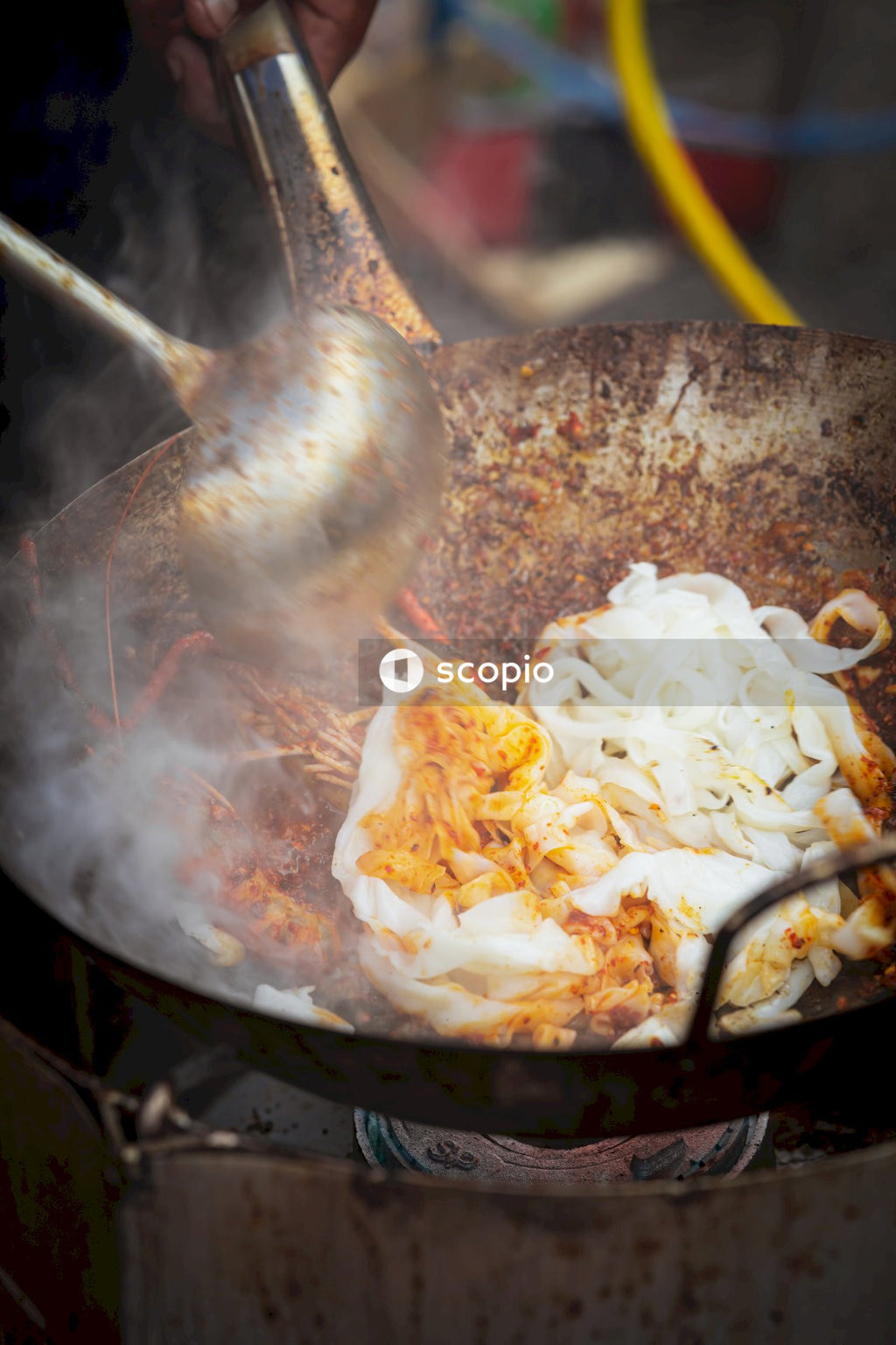 Cooked rice on black pan