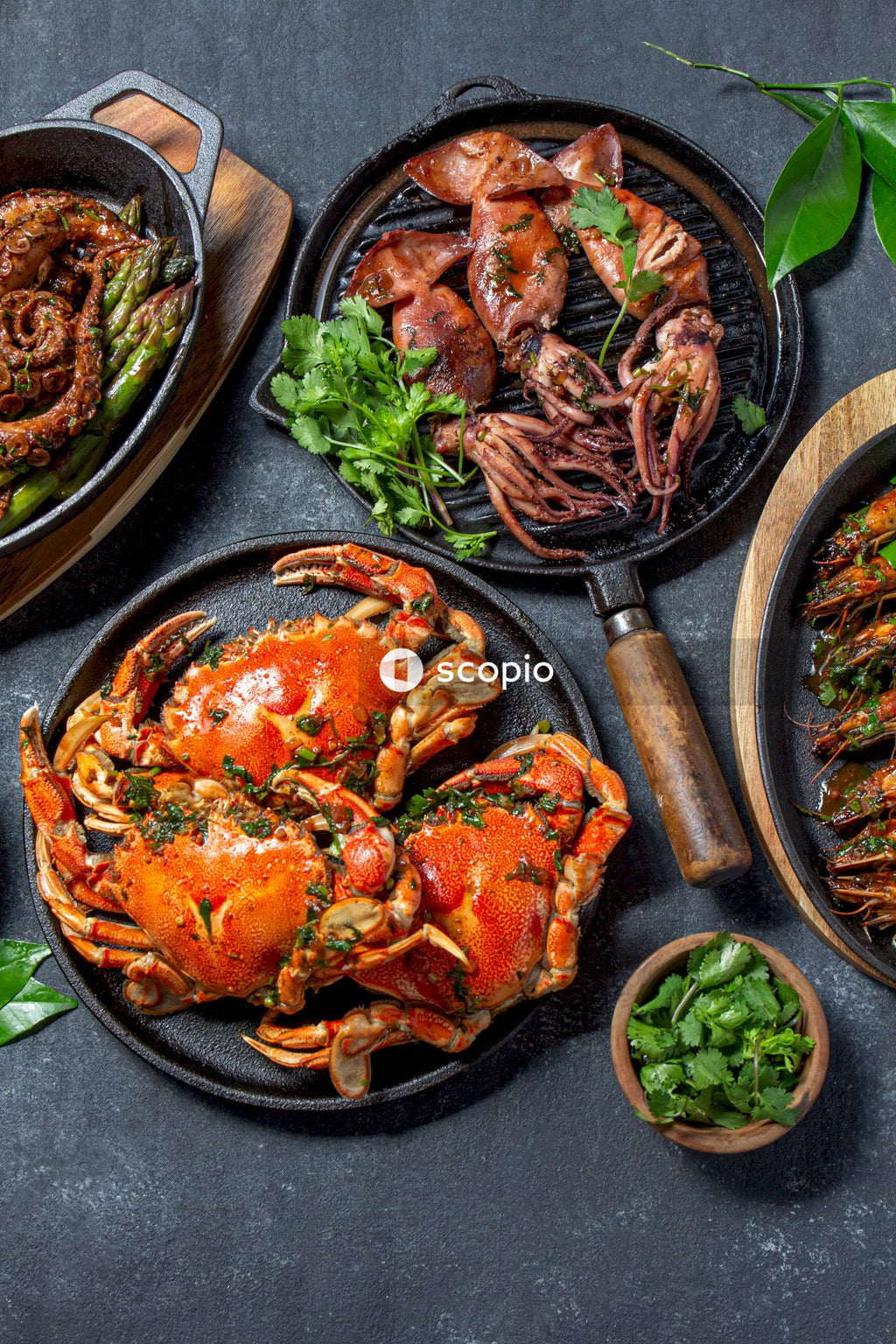 Cooked shrimp on black ceramic plate