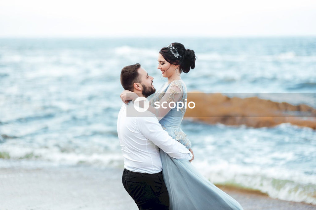 Couple kissing on beach