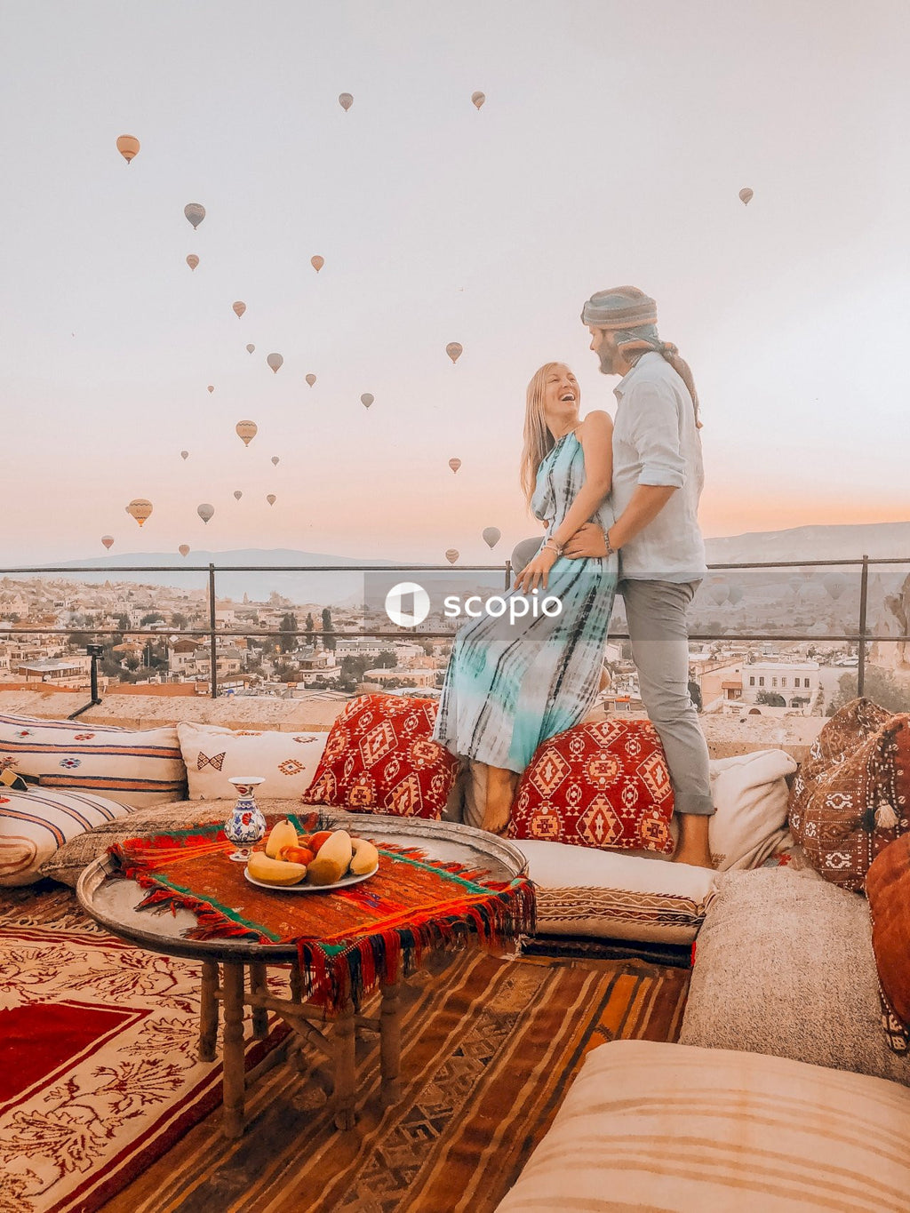 Couple kissing on brown wooden table
