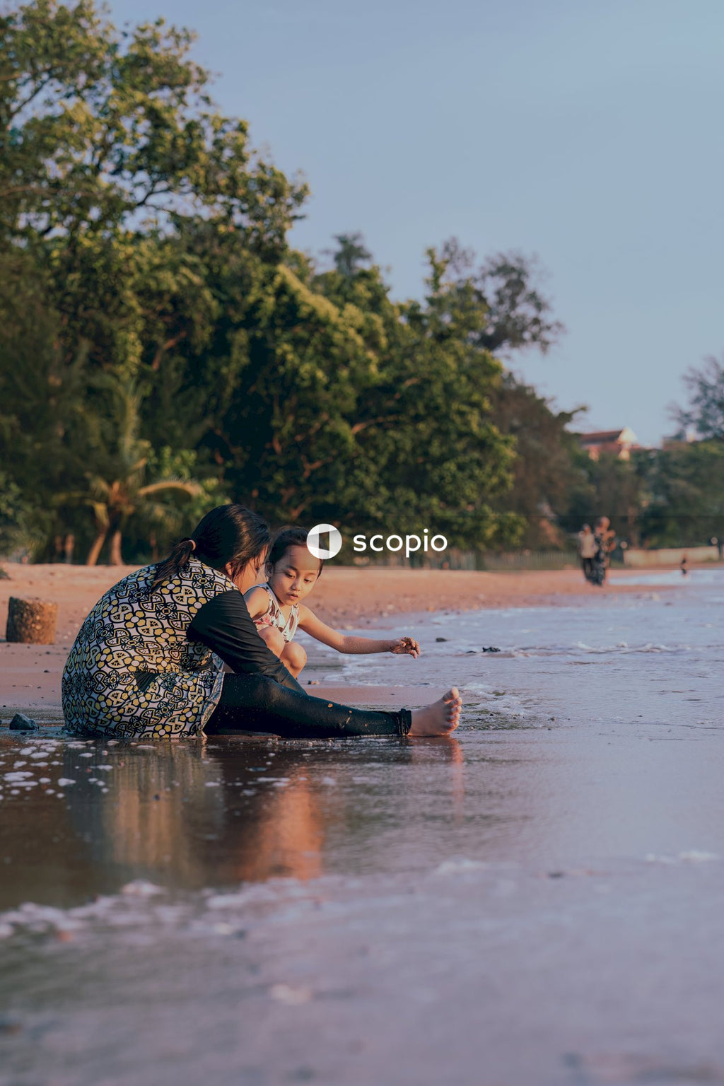 Couple sitting on water