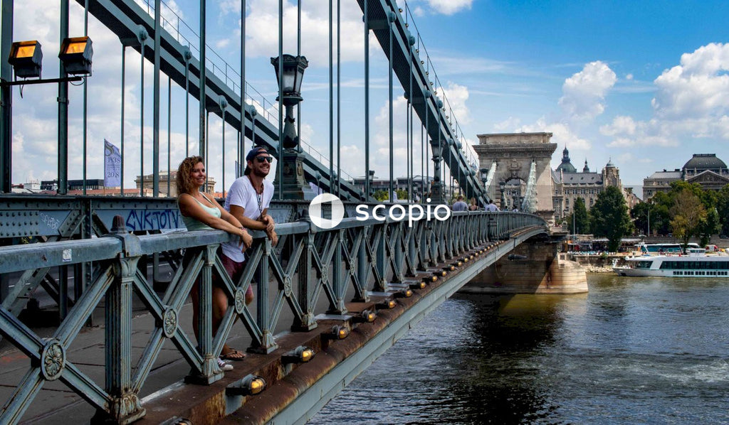 Couple standing on bridge