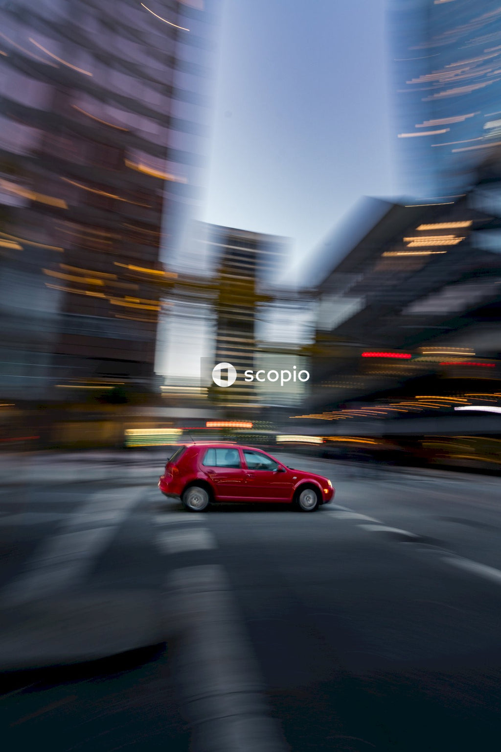 Time-lapse photo of car driving in city