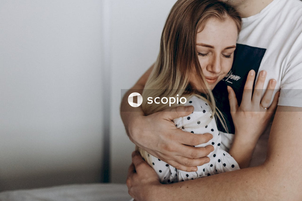 Husband and wife hugging