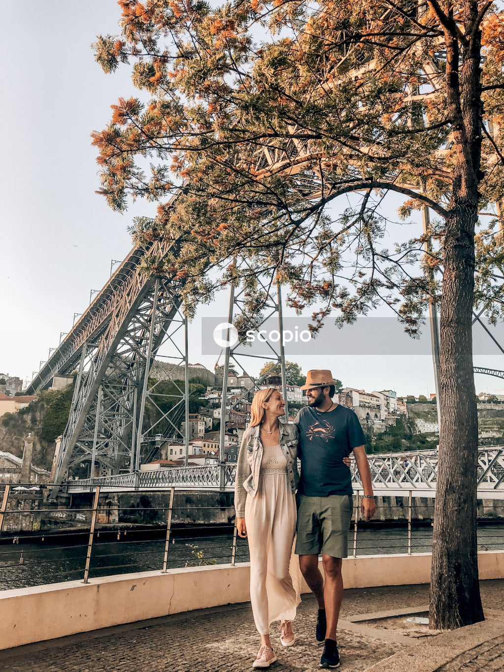 Couple walking on bridge