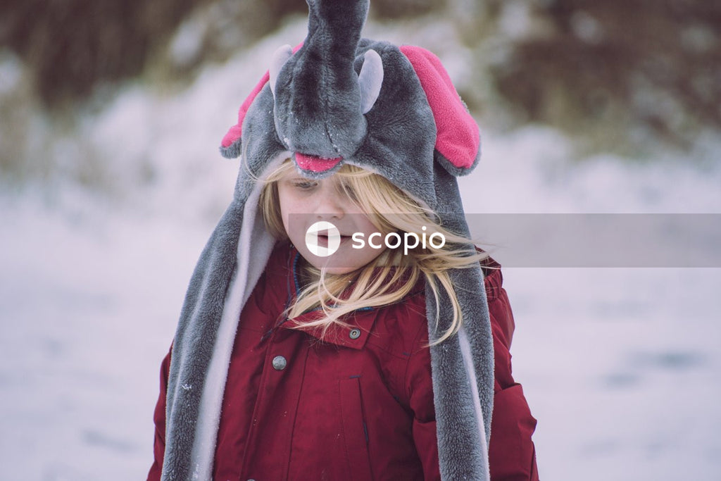 Girl in red and black jacket