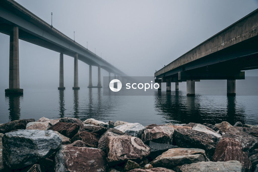 Brown wooden bridge over the sea