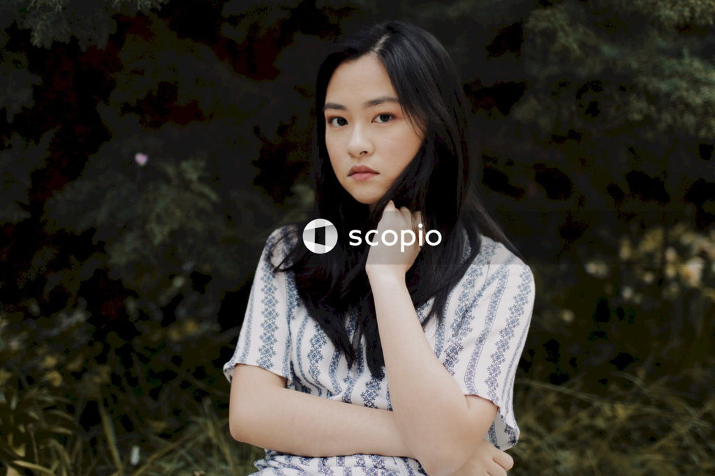 Girl wearing light and blue pattern dress