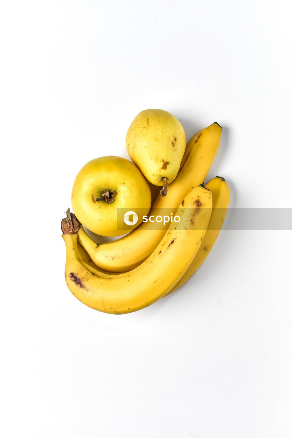 Yellow banana fruit on white table