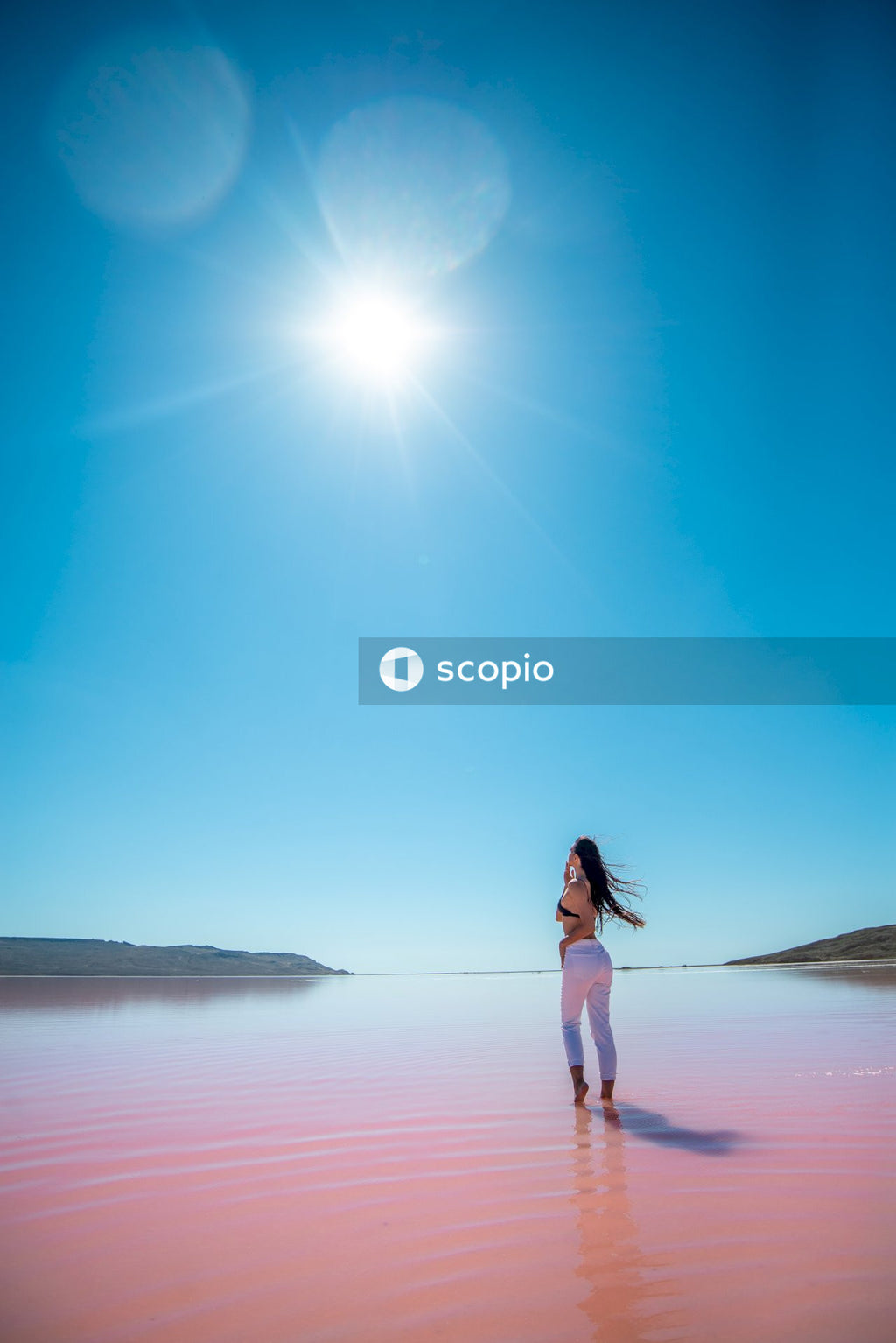 Woman standing on seashore