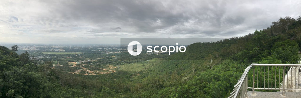 Green mountains under white clouds