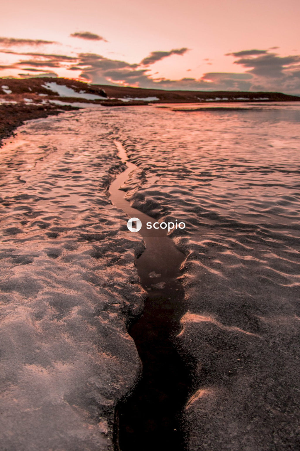 Body of water during sunset