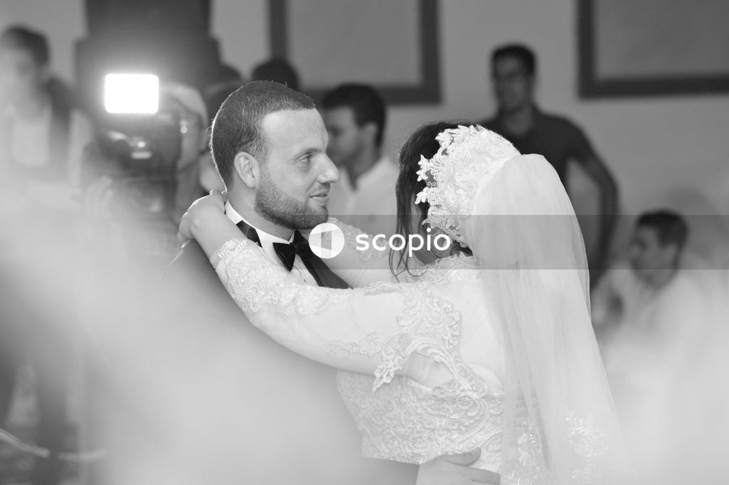 Grayscale photo of newly wed couple