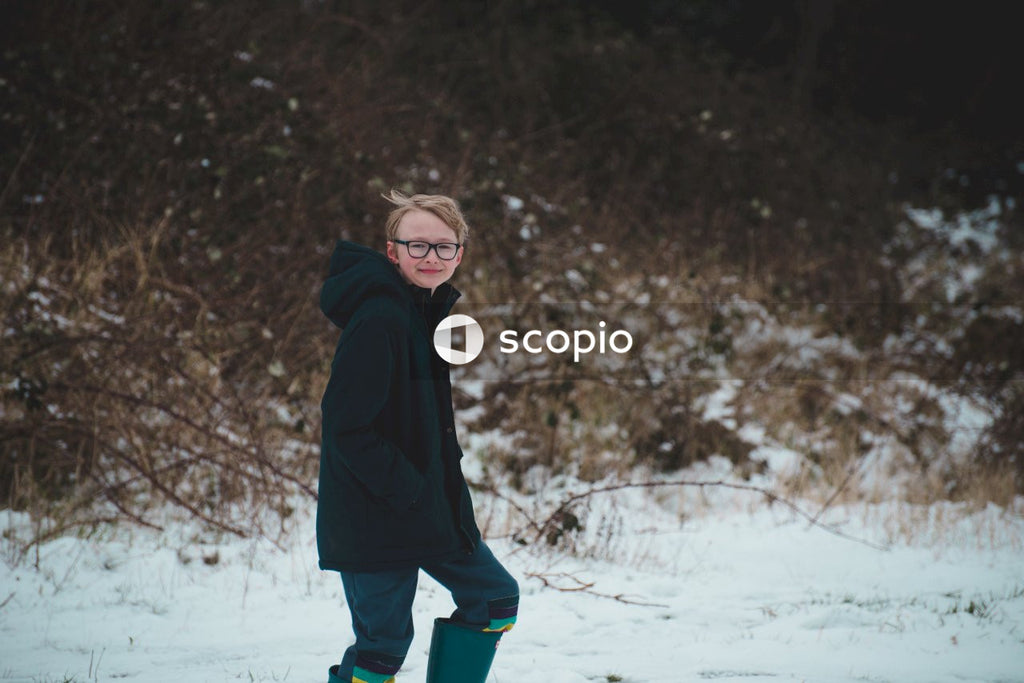Happy Boy Braving the Winter Cold