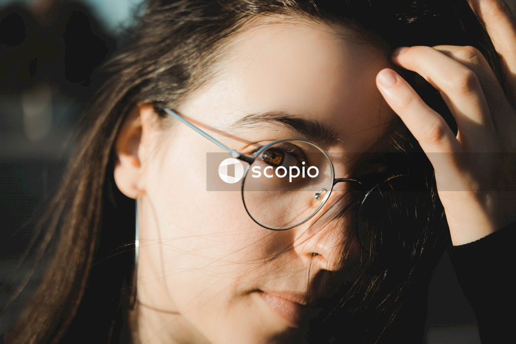 Portrait of woman wearing framed eyeglasses outdoor