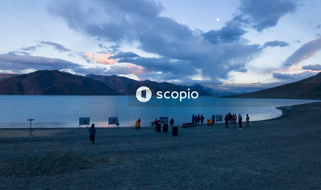 People standing on beach shore