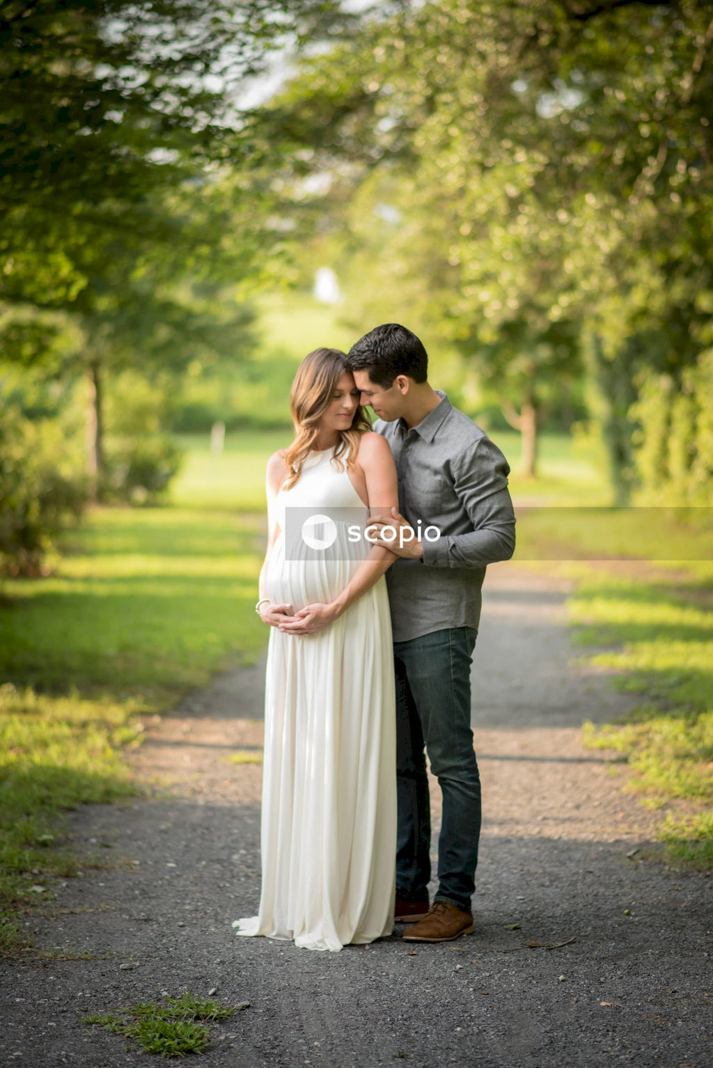 Man and woman kissing on road