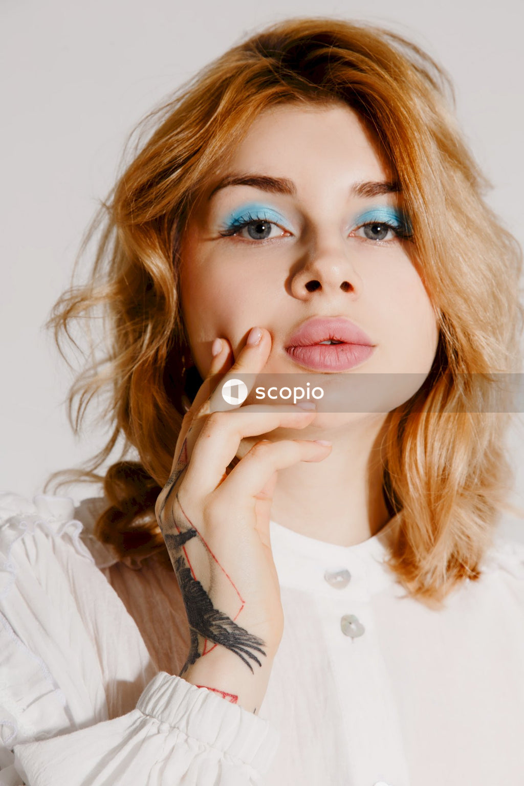 Girl in white button up shirt