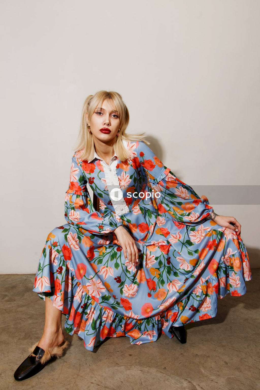 Girl in white red and green floral dress