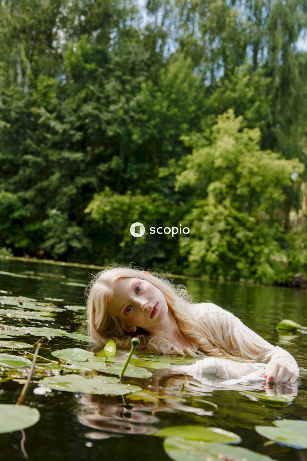 Girl in white shirt on water