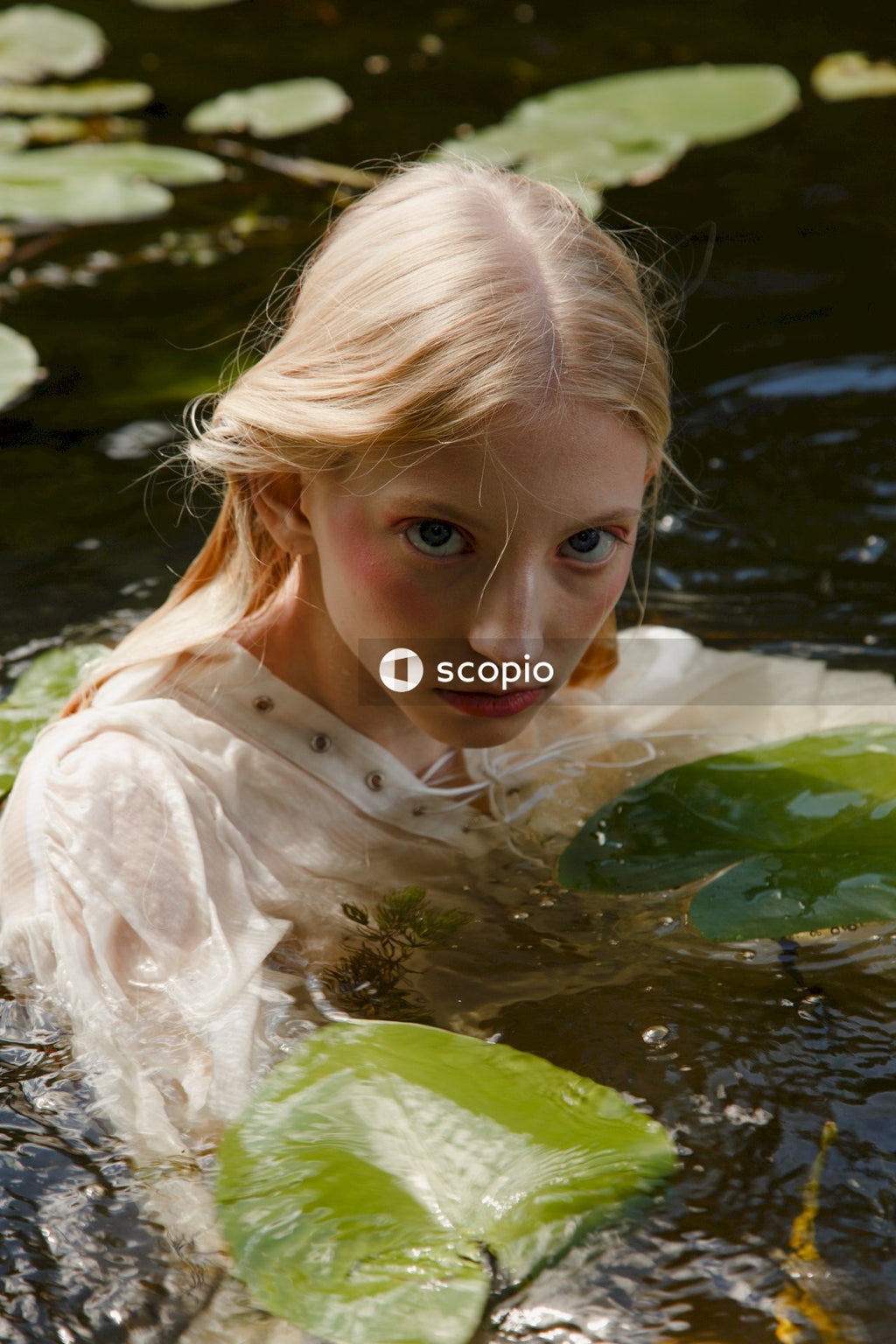 Girl in white shirt on water