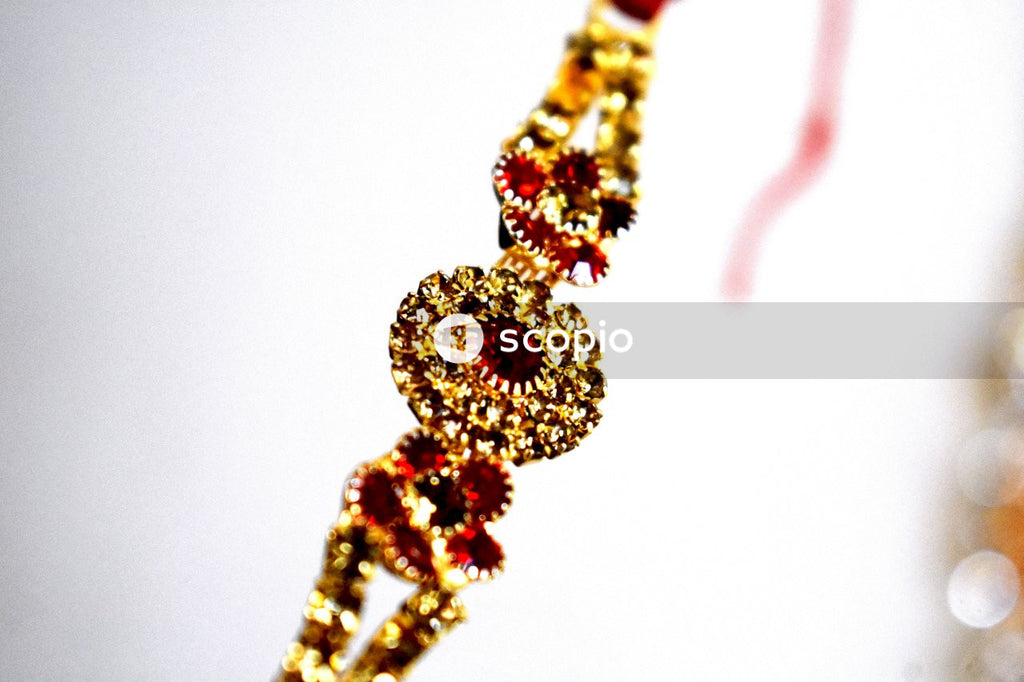 Gold and red beaded bracelet