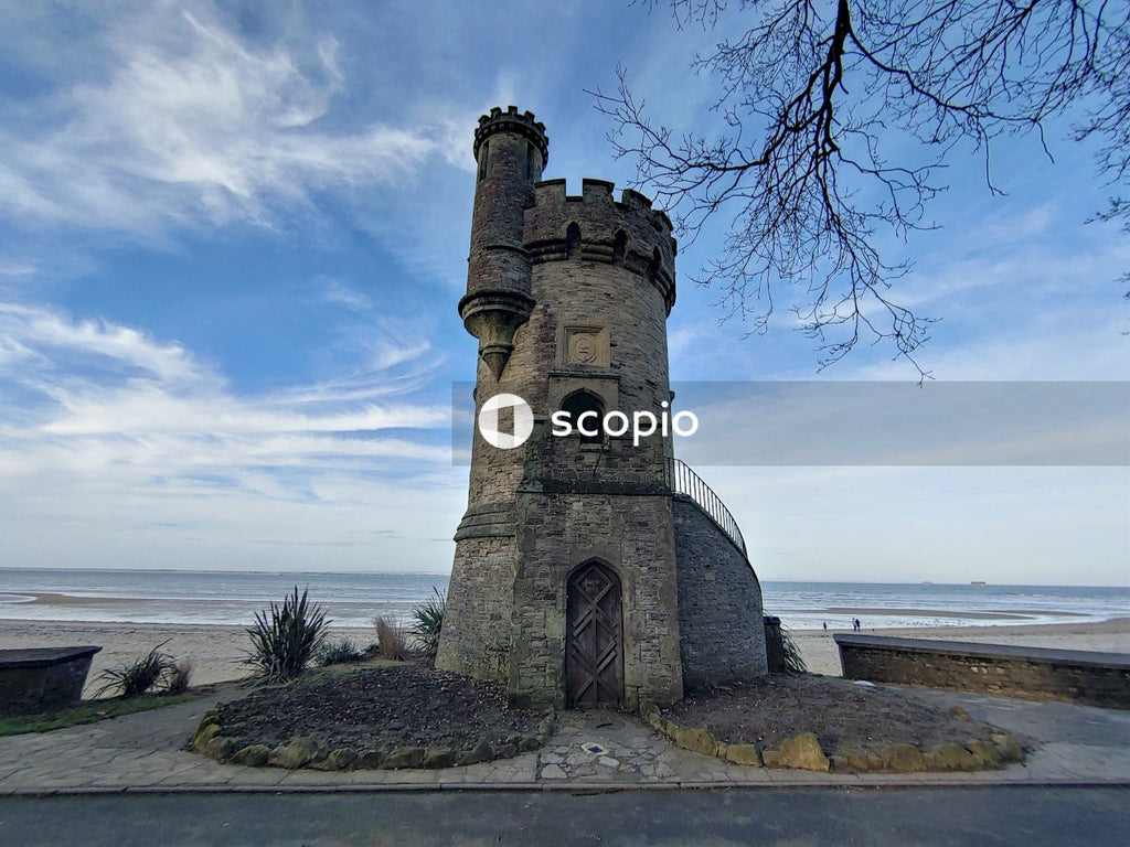 Gray concrete building near body of water