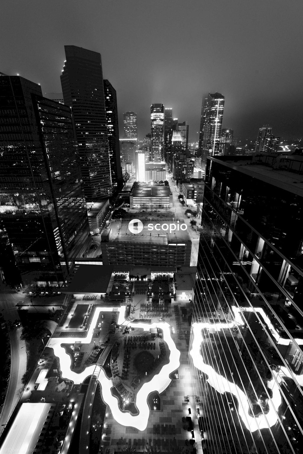 Grayscale photo of city buildings