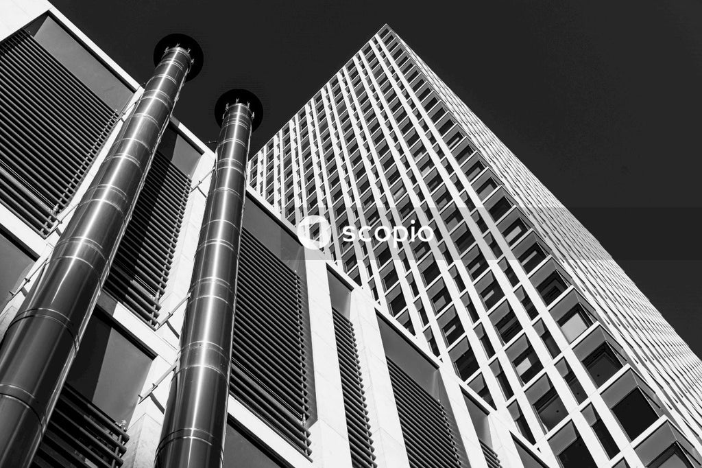 Grayscale photo of high rise building