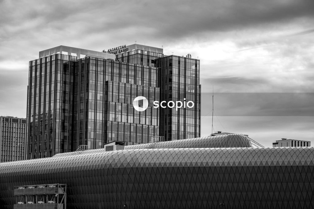Grayscale photo of high rise buildings