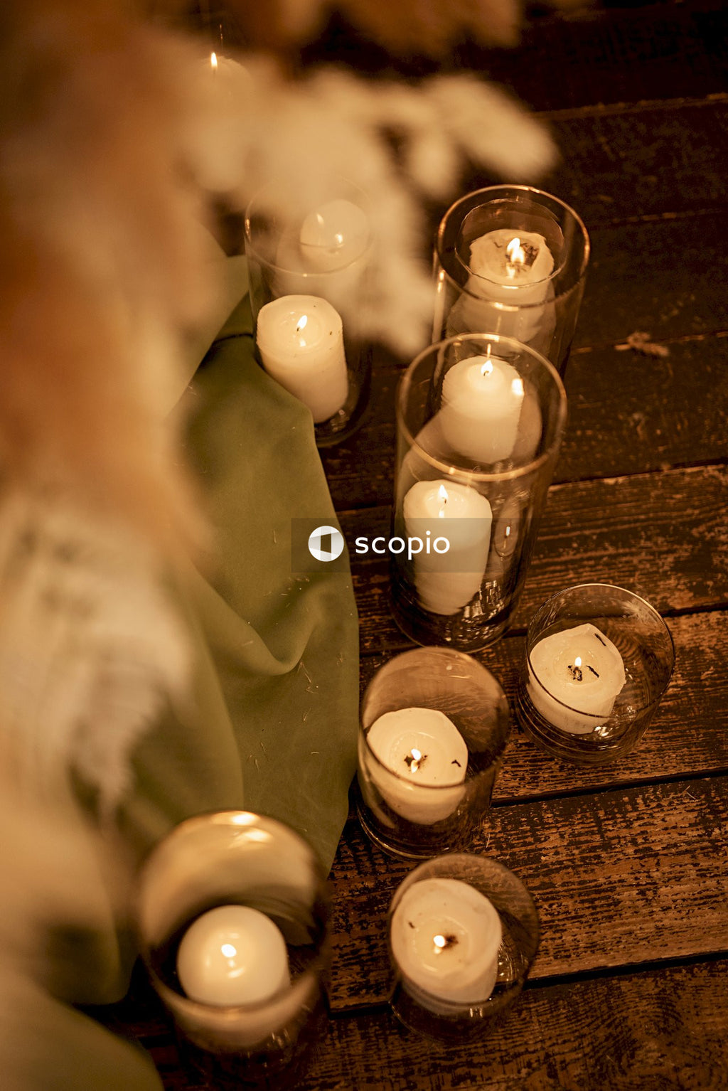 Grayscale photo of lighted candles