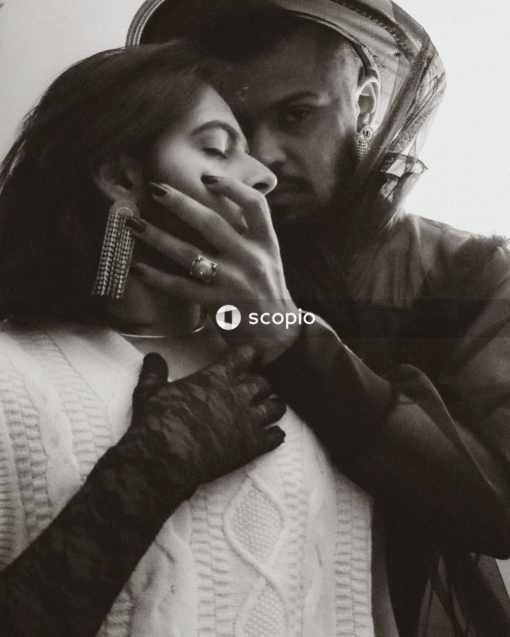 Grayscale photo of two men in romantic moment