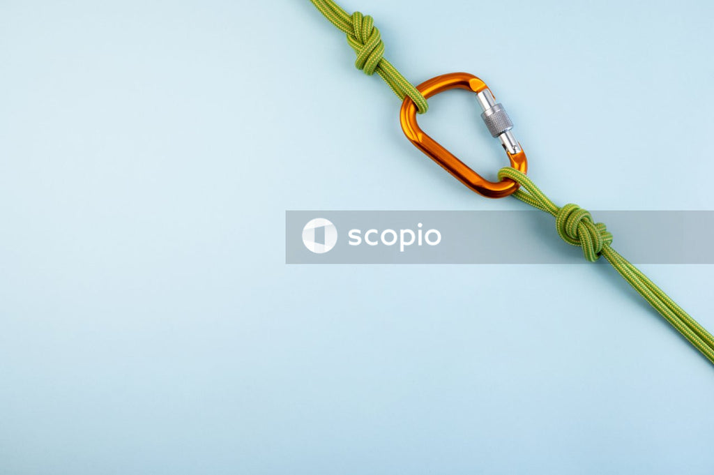 Green and yellow strap on white surface