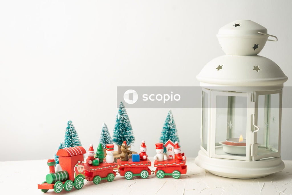 Green christmas tree with red and white baubles