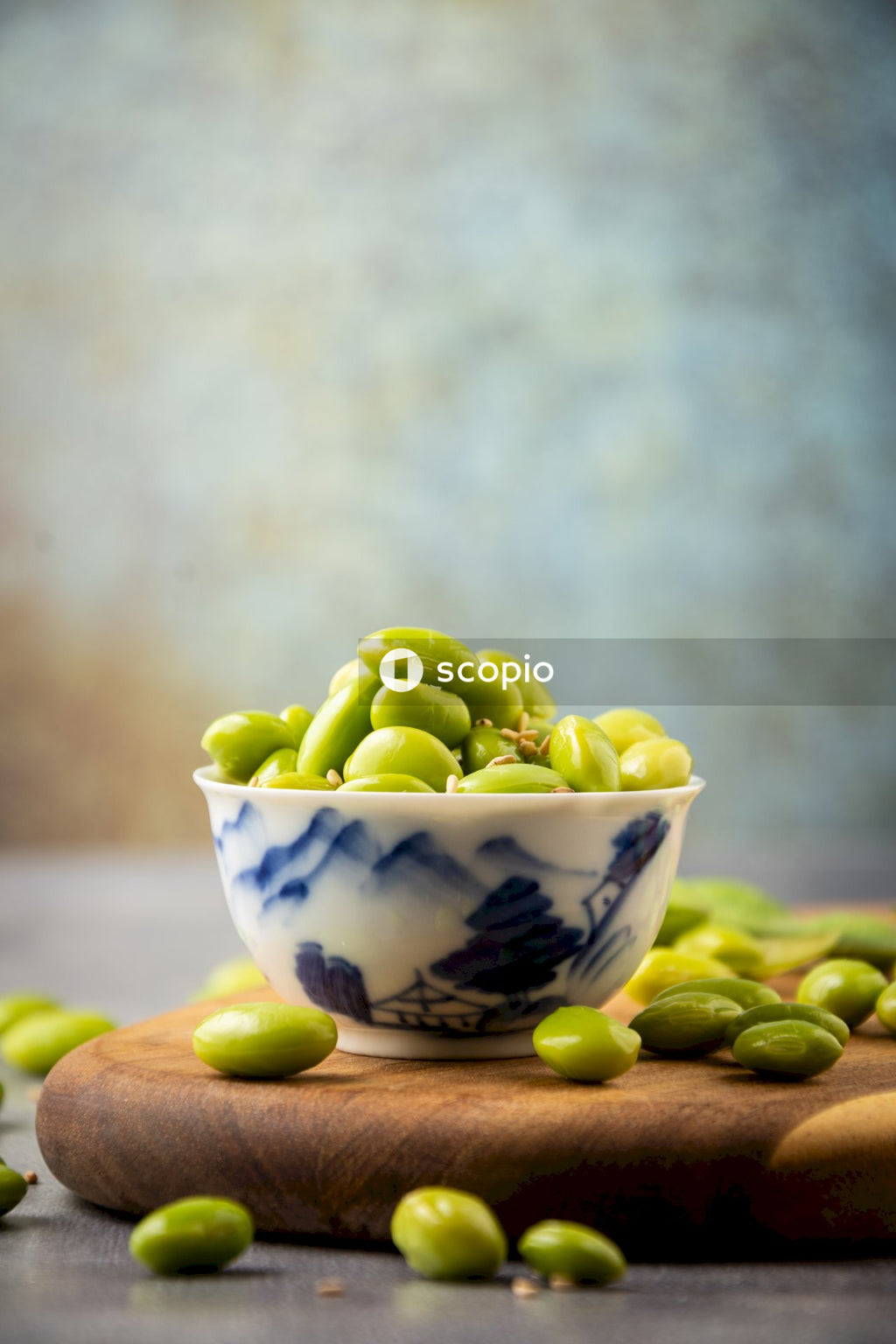 Green fruit in white ceramic bowl